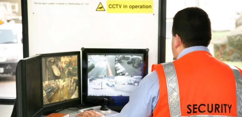 security guard watching cctv