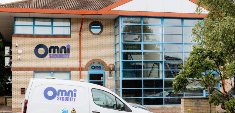 omni security headquarters with a van parked outside|towebp